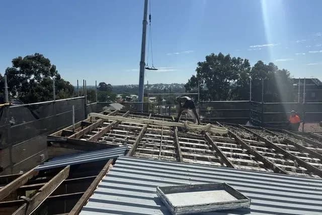 A Perth roof opened up, sheeting off and battens exposed